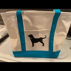 Black dog canvas tote bag